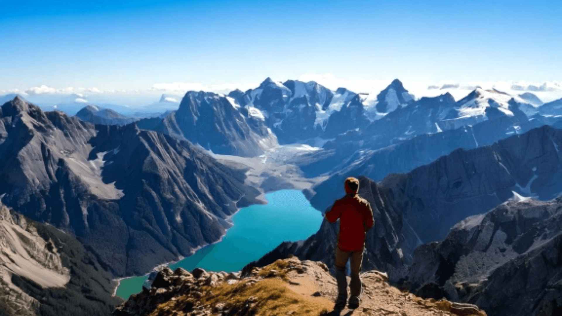 Vista dalla vetta su lago e montagne innevate — piano Summit